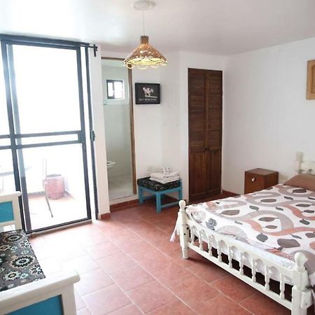 Hostal El Cascabel Чолула Екстериор снимка